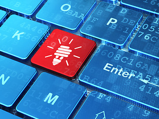 Image showing Business concept: Energy Saving Lamp on computer keyboard background