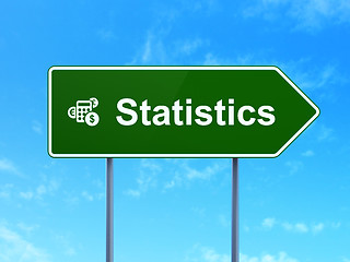 Image showing Business concept: Statistics and Calculator on road sign background