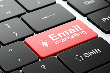 Image showing Finance concept: Light Bulb and Email Marketing on computer keyboard background