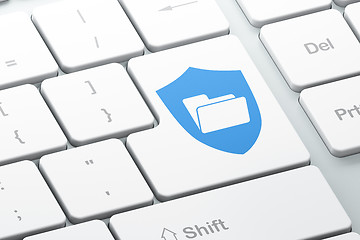 Image showing Finance concept: Folder With Shield on computer keyboard background