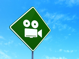 Image showing Travel concept: Camera on road sign background