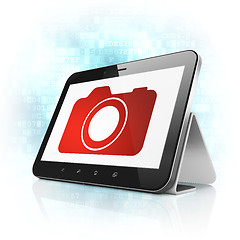 Image showing Travel concept: Photo Camera on tablet pc computer