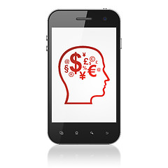 Image showing Finance concept: Head With Finance Symbol on smartphone