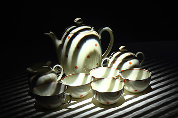 Image showing porcelain in the dark night (light effect)