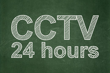 Image showing Privacy concept: CCTV 24 hours on chalkboard background