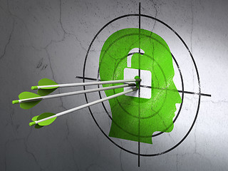 Image showing Business concept: arrows in Head With Padlock target on wall background