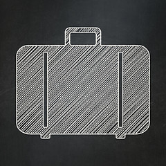 Image showing Vacation concept: Bag on chalkboard background