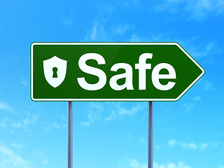 Image showing Safety concept: Safe and Shield With Keyhole on road sign background