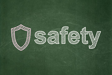 Image showing Security concept: Contoured Shield and Safety on chalkboard background