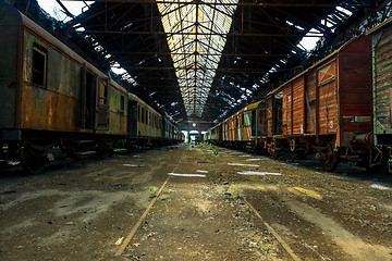 Image showing Cargo trains in old train depot