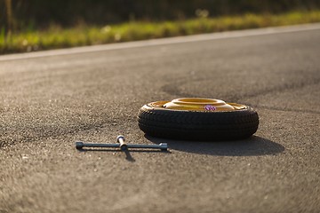 Image showing Emergency tyre on the road