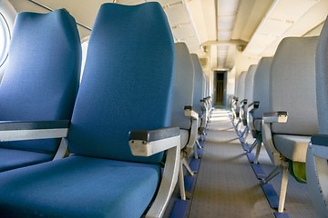 Image showing Interior of an airplane with many seats