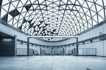 Image showing Moving escalator in the business center