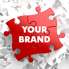 Image showing Your Brand Concept on Red Puzzle.