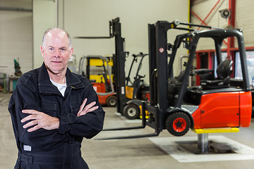 Image showing worker in maintenance service station