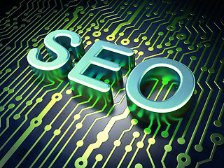 Image showing SEO web development concept: SEO on circuit board background