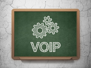 Image showing Web development concept: Gears and VOIP on chalkboard background