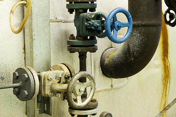 Image showing Steam pipes with pressure relief valves