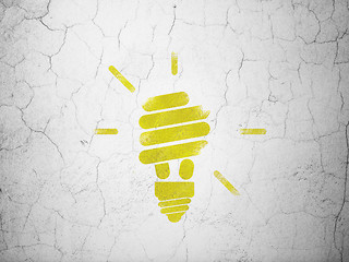 Image showing Business concept: Energy Saving Lamp on wall background