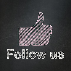 Image showing Social media concept: Thumb Up and Follow us on chalkboard