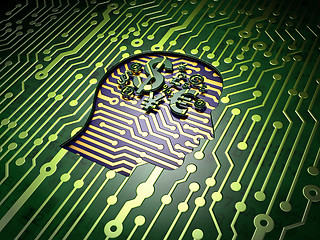 Image showing Business concept: Head With Finance Symbol on circuit board background