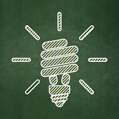 Image showing Business concept: Energy Saving Lamp on chalkboard background