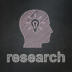 Image showing Marketing concept: Head With Light Bulb and Research on chalkboard background