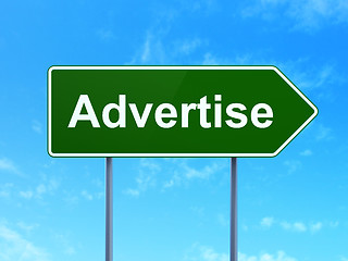 Image showing Advertising concept: Advertise on road sign background