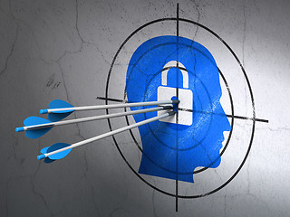 Image showing Business concept: arrows in Head With Padlock target on wall background