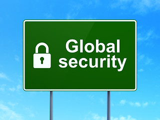 Image showing Safety concept: Global Security and Closed Padlock on road sign background