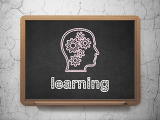 Image showing Education concept: Head With Gears and Learning on chalkboard background