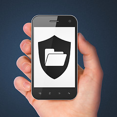 Image showing Finance concept: Folder With Shield on smartphone