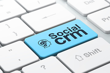 Image showing Business business concept: Head With Gears and Social CRM on computer keyboard background