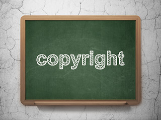 Image showing Law concept: Copyright on chalkboard background