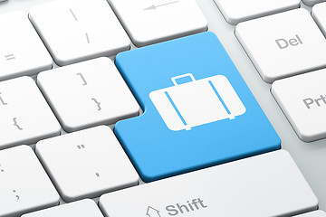 Image showing Travel concept: Bag on computer keyboard background