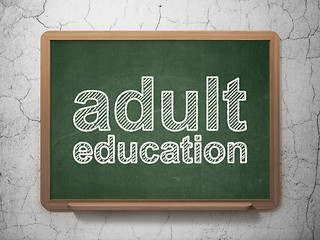 Image showing Adult Education on chalkboard background