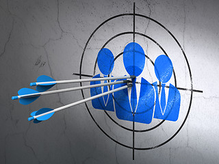 Image showing Advertising concept: arrows in Business People target on wall background