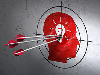 Image showing Marketing concept: arrows in Head With Light Bulb target