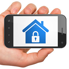 Image showing Finance concept: Home on smartphone
