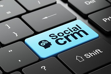 Image showing Finance concept: Head With Gears and Social CRM on keyboard