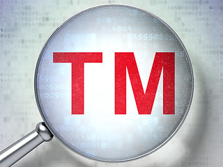 Image showing Law concept: Trademark with optical glass on digital background