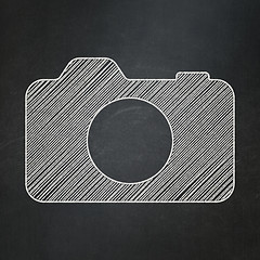 Image showing Travel concept: Photo Camera on chalkboard background