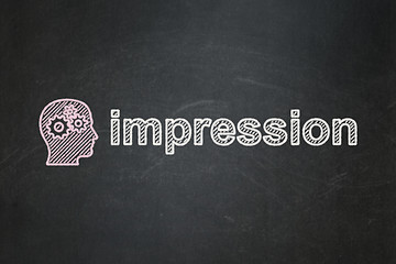 Image showing Advertising concept: Head With Gears and Impression on chalkboard background