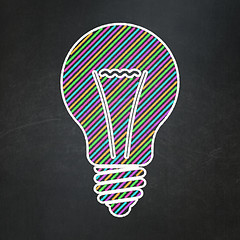 Image showing Finance concept: Light Bulb on chalkboard background