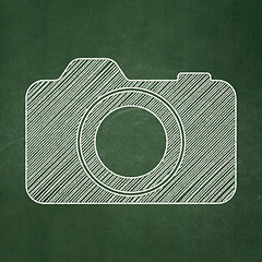 Image showing Travel concept: Photo Camera on chalkboard background