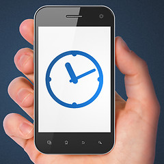 Image showing Timeline concept: Clock on smartphone