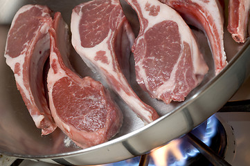 Image showing rib lamb chops in frying pan cooking