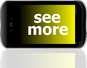 Image showing smartphone with word see more on display, business concept