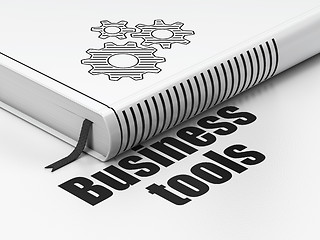 Image showing Finance concept: book Gears, Business Tools on white background