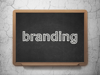 Image showing Marketing concept: Branding on chalkboard background